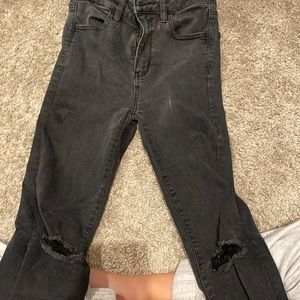 ripped black jeans